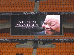 video board display at Mandela's memorial